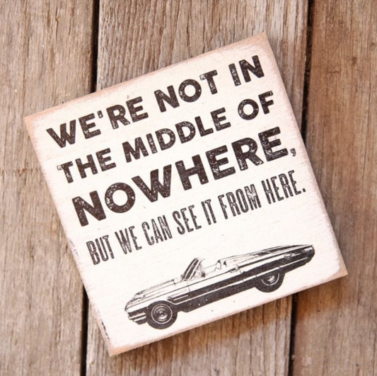 We're Not In The Middle Of Nowhere Wood Sign